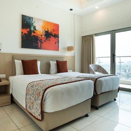 Ar Suites Klj Square Гургаон Экстерьер фото